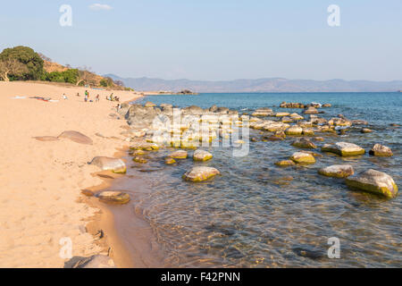 View of rocky lakeside and sandy beach, Kaya Mawa, Likoma Island, Lake Malawi, Malawi, south-east Africa Stock Photo