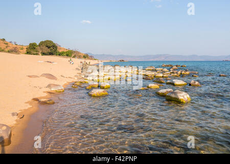 View of rocky lakeside and sandy beach, Kaya Mawa, Likoma Island, Lake Malawi, Malawi, south-east Africa Stock Photo