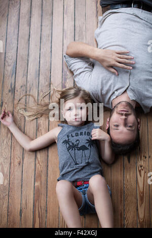 Little girl and father hanging out together Stock Photo