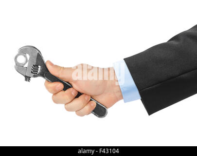 Adjustable spanner in hand Stock Photo