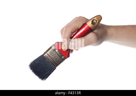 Whitewashing brush in a man's hand Stock Photo