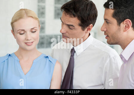Business colleagues talking together Stock Photo