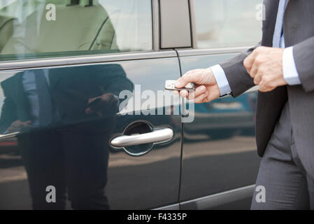 Unlocking car with remote control Stock Photo
