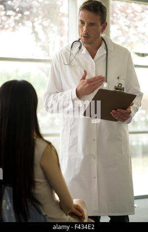 Doctor explaining test results to patient Stock Photo