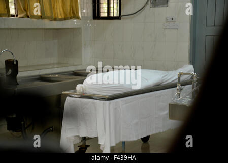 Dhaka, Bangladesh. 14th Oct, 2015. The body of Italian citizen Cesare Tavella, who was shot to death on September 28 by unidentified assailants, lays in the morgue at the Dhaka Medical College in Dhaka on October 14, 2015.  The body of murdered aid worker Cesare Tavella of Italian citizen was handed over to the Italian embassy from Dhaka Medical College and Hospital. Italian consular attachés Denil Paolo Notaro and Giovanni Cianni received the body. Credit:  Mamunur Rashid/Alamy Live News Stock Photo