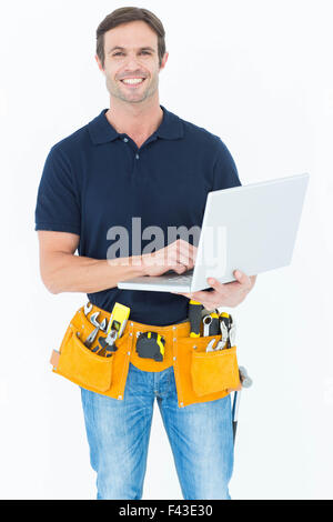 Confident architect using laptop Stock Photo