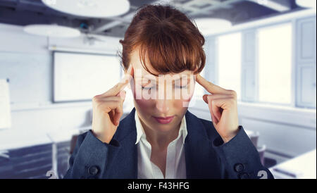 Composite image of stressed businesswoman Stock Photo