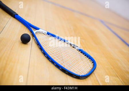 Close up of a squash racket and ball Stock Photo