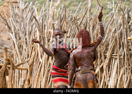 Young Hamar Women Taunt A Hamar Tribesman In To Whipping Them