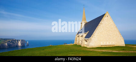 Panoramic view of Church Notre Dame de la Garde chapel and Etretat Aval cliff, Normandy, France, Europe Stock Photo