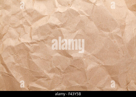 Rumpled brown cardboard paper texture Stock Photo