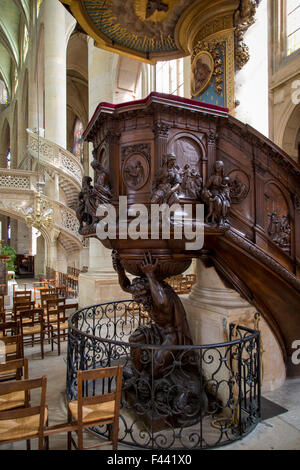 Ornate pulpit and Interior of Eglise Saint Etienne du-Mont, Latin Quarter, Paris France Stock Photo