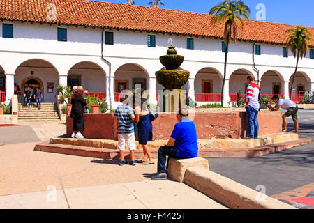 Latino tourists visit the Santa Barbara Mission in California. Founded by Padre Fermin Lasuen in 1786 Stock Photo