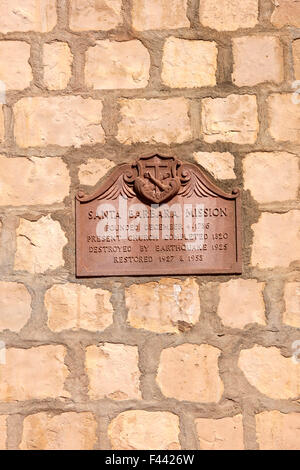 Wall plaque of the Santa Barbara Mission in California. Dating it's founding and subsequent history Stock Photo