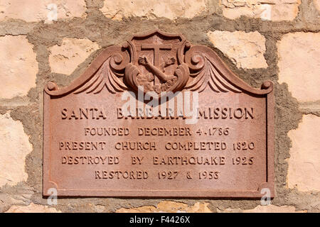 Wall plaque of the Santa Barbara Mission in California. Dating it's founding and subsequent history Stock Photo