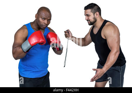 Strong friends using kettlebells together Stock Photo