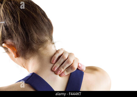 Fit brunette with neck injury Stock Photo