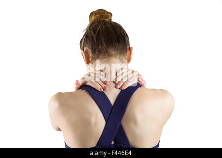 Fit brunette with neck injury Stock Photo