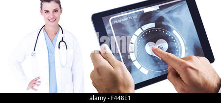 Composite image of man using tablet pc Stock Photo