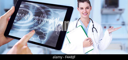 Composite image of man using tablet pc Stock Photo