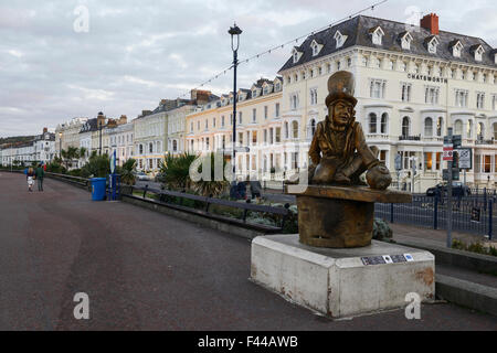 Mad Hatter statue, carved from wood, from Alice in Wonderland story on the promenade in Llandudno. Stock Photo