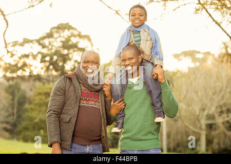 Extended family posing with warm clothes Stock Photo