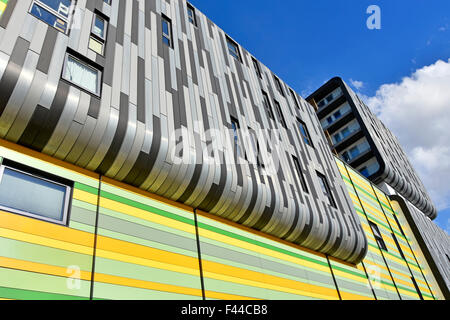Woolwich Central South London England UK shades of grey & colours used in striped cladding exterior of modern apartment buiding providing new homes Stock Photo