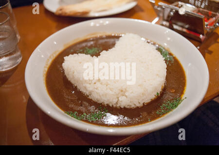 Cat shaped rice and curry on plate Stock Photo