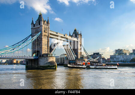 Paddle Steamer Waverley leaving the Pool of London through an open Tower Bridge. Stock Photo