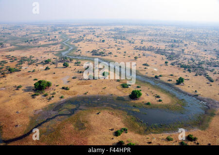 Okavango Delta. 12th Oct, 2015. Aerial photo taken on Oct.12, 2015 shows the view of Okavango Delta, northwest Botswana. Botswana's Okavango Delta was listed as the 1,000th site inscribed on the World Heritage List in 2014. The Delta, about 40 kilometers from Tsodilo Hills, comprises permanent marshlands and seasonally flooded plains. It is one of the very few major interior delta systems that do not flow into a sea or ocean, with a wetland system that is almost intact. © Lyu Tianran/Xinhua/Alamy Live News Stock Photo