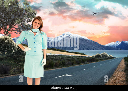 Composite image of air hostess Stock Photo