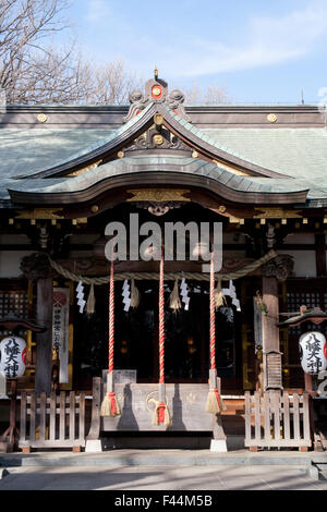 Japanese shinto shrine with rope bells portrait Stock Photo