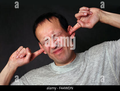 Unwillingness to hear Stock Photo