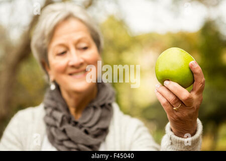 Senior woman in the park Stock Photo