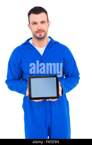Mechanic pointing on digital tablet Stock Photo