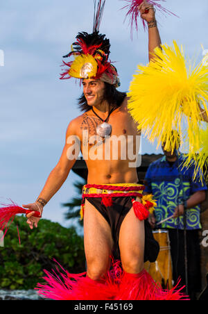 Native male Hawaiian performing traditional dance at Lua, Big Island, Hawai'i, USA Stock Photo