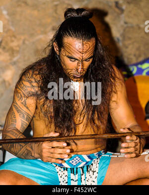 Native male Hawaiian performing traditional dance at Lua, Big Island, Hawai'i, USA Stock Photo