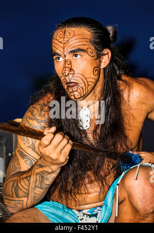 Native male Hawaiian performing traditional dance at Lua, Big Island, Hawai'i, USA Stock Photo