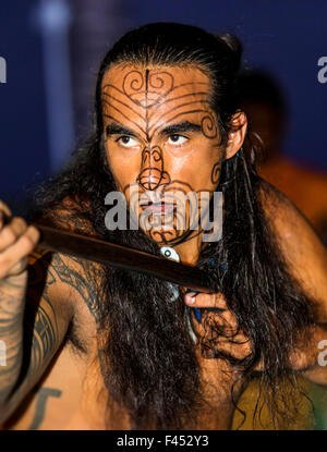 Native male Hawaiian performing traditional dance at Lua, Big Island, Hawai'i, USA Stock Photo