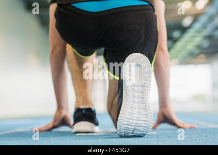 Fit man at the starting line Stock Photo