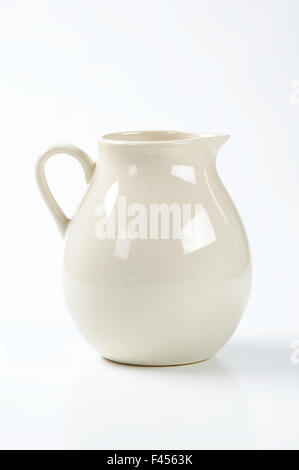 empty milk jug on white background Stock Photo