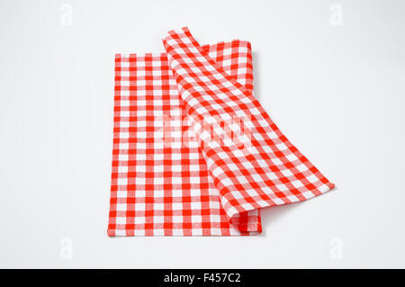 red and white checkered napkin on white background Stock Photo