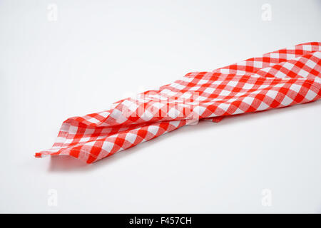 red and white checkered napkin on white background Stock Photo
