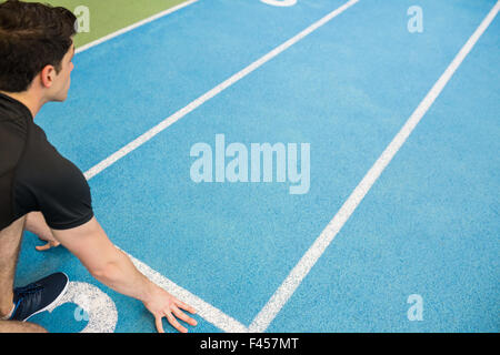 Fit man at the starting line Stock Photo