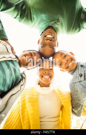 Young family doing a head circles Stock Photo