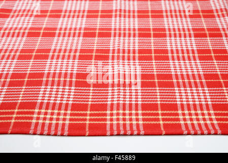 red and white checkered dishtowel on white background Stock Photo