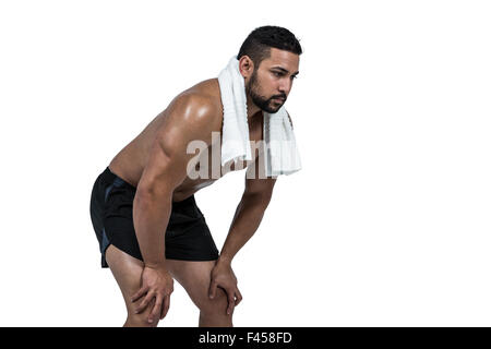 Muscular man with towel on shoulders Stock Photo