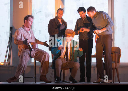London, UK. 14/10/2015. L-R: Duncan Rock as Marcello, Nicholas Masters as Colline, Simon Butteriss as Benoit, Zach Borichevsky as Rodolfo and Ashley Riches as Schaunard. Dress rehearsal of the Giacomo Puccini opera La Boheme directed by Benedict Andrews at the London Coliseum. Conducted by Xian Zhang. Cast: Corinne Winters as Mimi, Zach Borichevsky as Rodolfo, Duncan Rock as Marcello and Rhian Lois as Musetta. Stock Photo