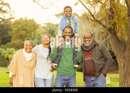 Extended family posing with warm clothes Stock Photo