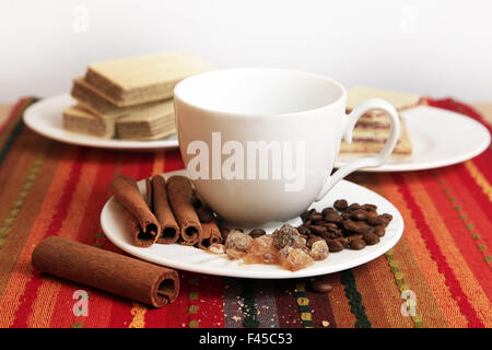 Cinnamon sticks with cup Stock Photo